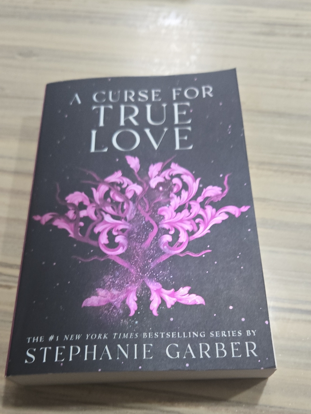 A Curse for True Love by Stephanie Garber - Black & Pink Cover